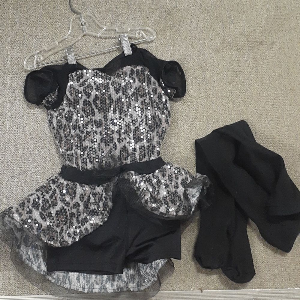Beautiful leopard black‎ and pink dance leotard and black tights to go with it.